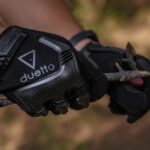 duetto gloves wallpaper2 1030x1030 1 DUETTO Gantia Shield Mauro